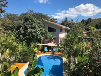 High ceilings, teak pool terrace, minutes from the beach — Casa Morpho, Sámara